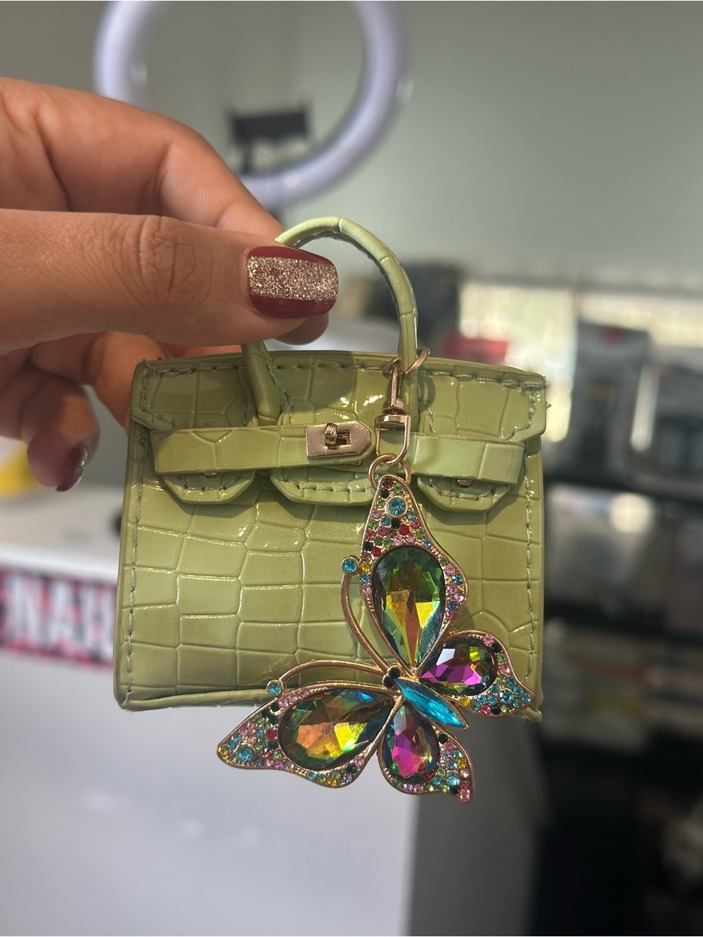 Mini Croc-Embossed Top Handle Bag in Light Green with Jewel Butterfly Charm